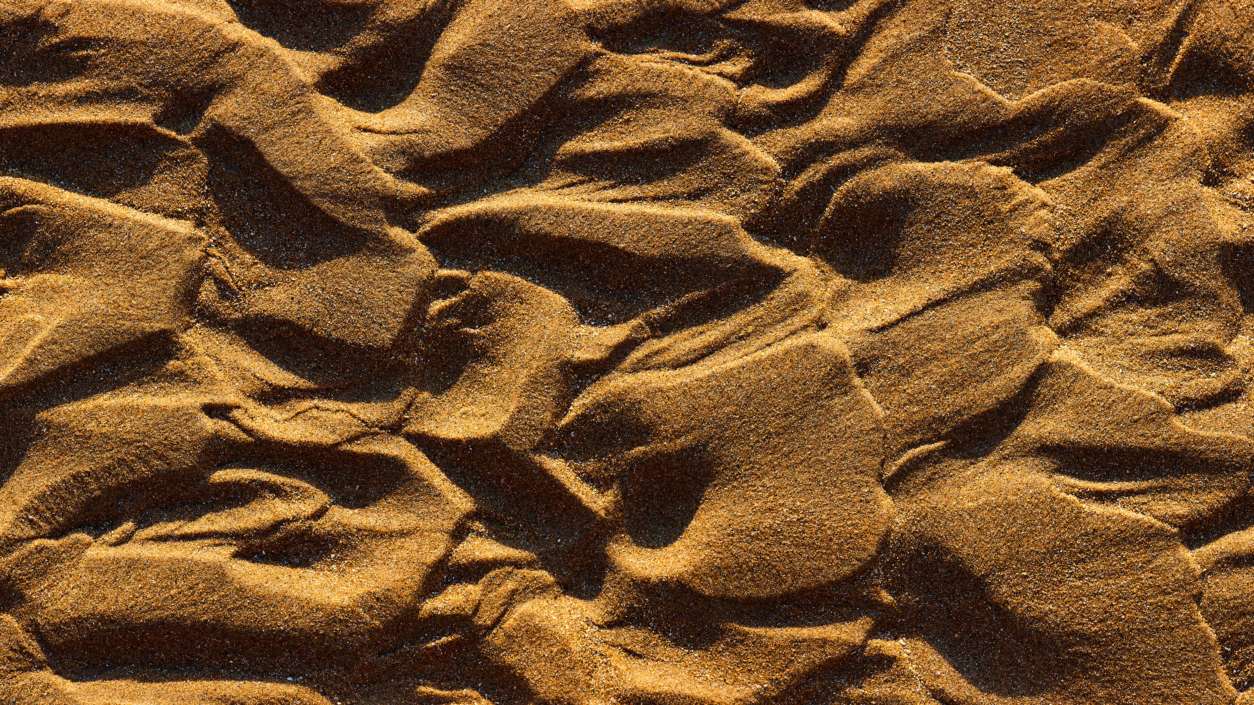 golden textured sand on the beach
